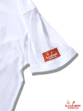 White shirt with a red logo on the sleeve against a white background