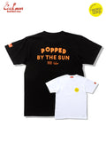 Black and white t-shirts with 'Popped by the Sun' text and brand logos.