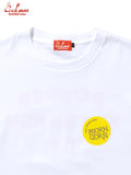 White t-shirt with a yellow 'Bjorn Qorn' logo and a red label on a white background