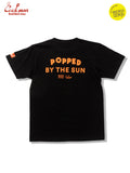 Black t-shirt with 'Popped by the Sun' text on the back, featuring a brand logo on the sleeve.