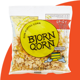 Bjorn Qorn spicy one-ounce bag on red background. 