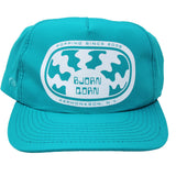 Teal and white adventure hat. 