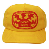 Yellow and red adventure hat. 